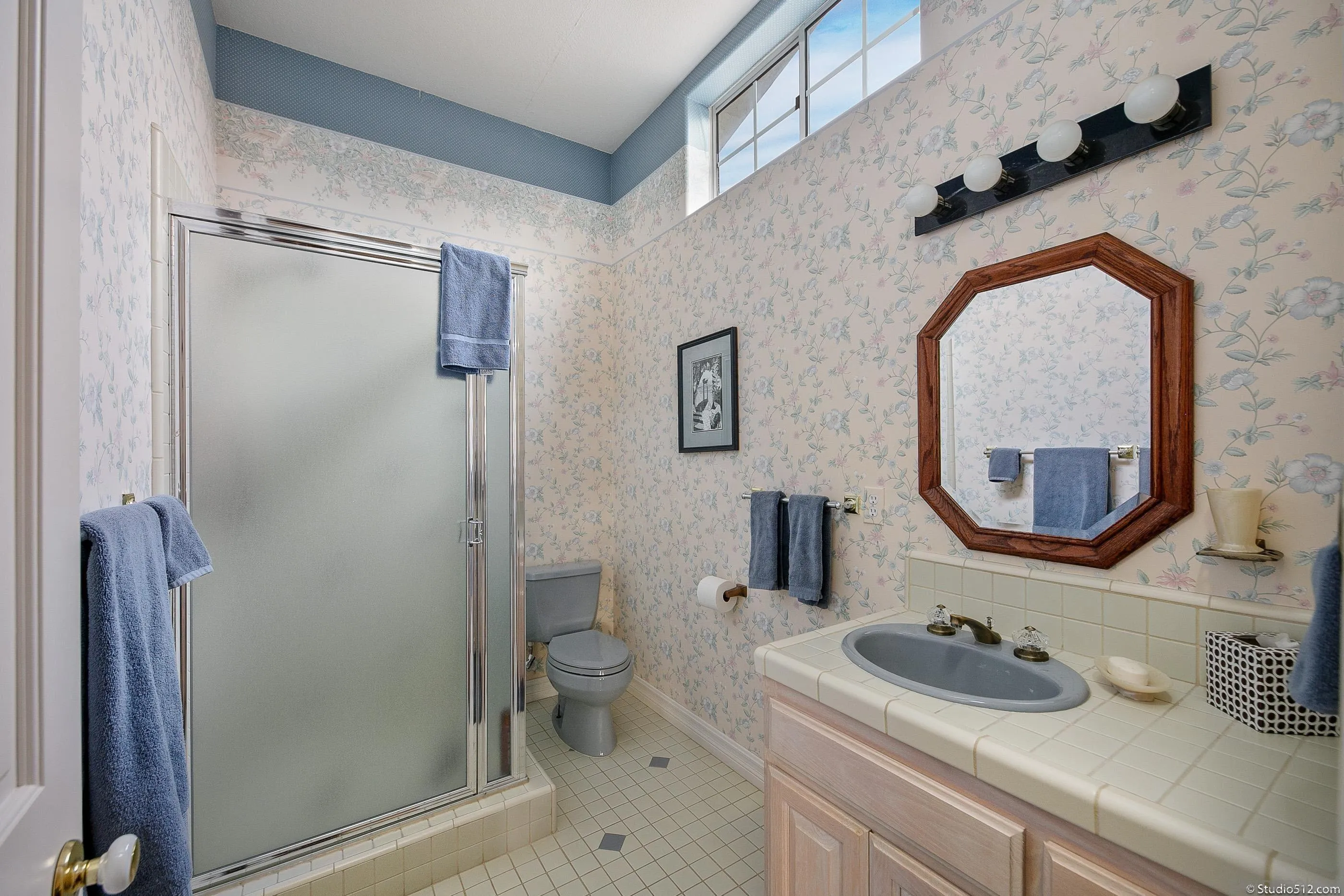 28398 Alamar Road Valley Center, CA 92082 - Photo 21 of 41 a bathroom with a sink a toilet and shower a mirror