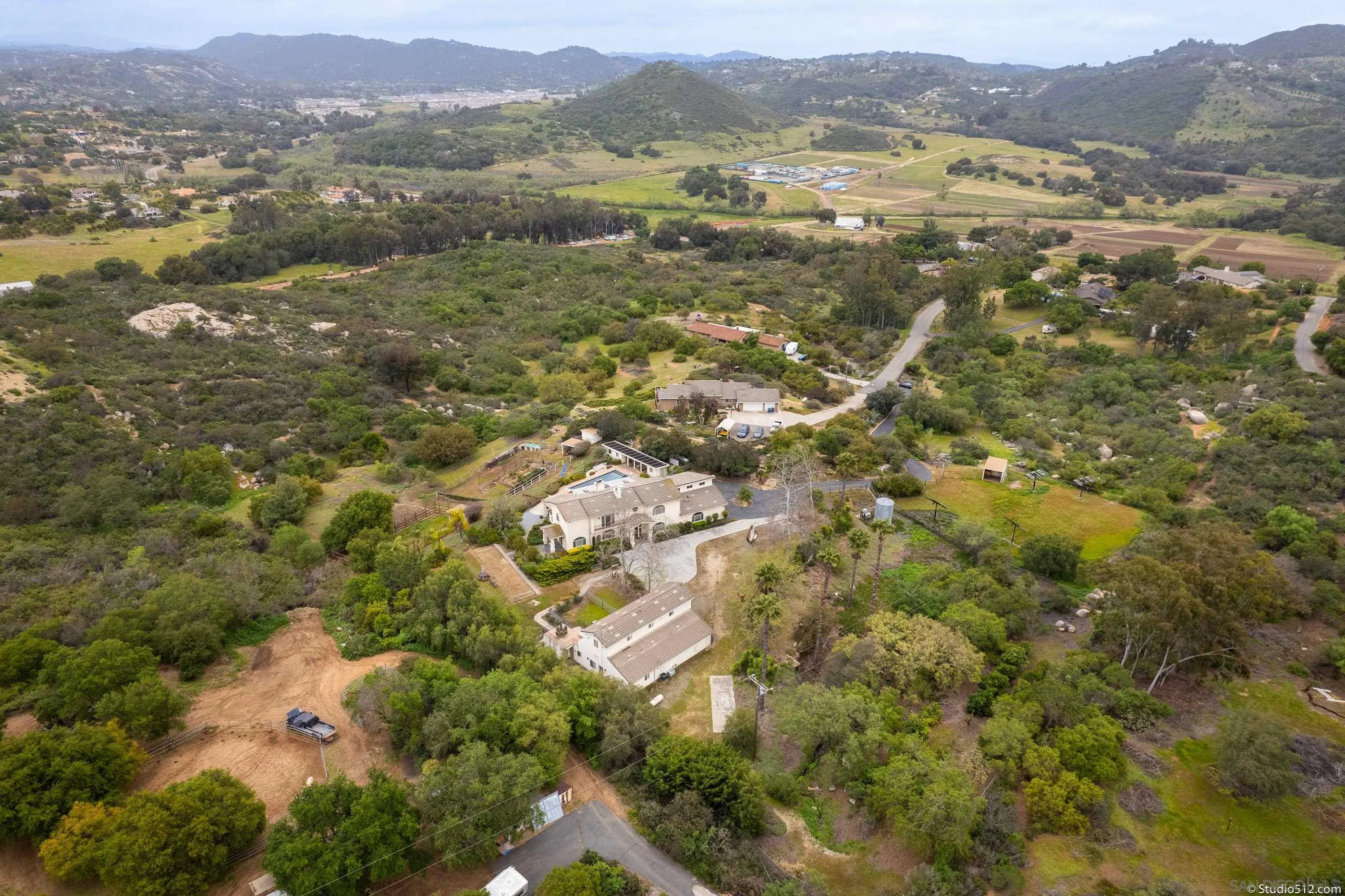 28398 Alamar Road Valley Center, CA 92082 - Photo 36 of 41 an aerial view of residential houses with outdoor space and trees