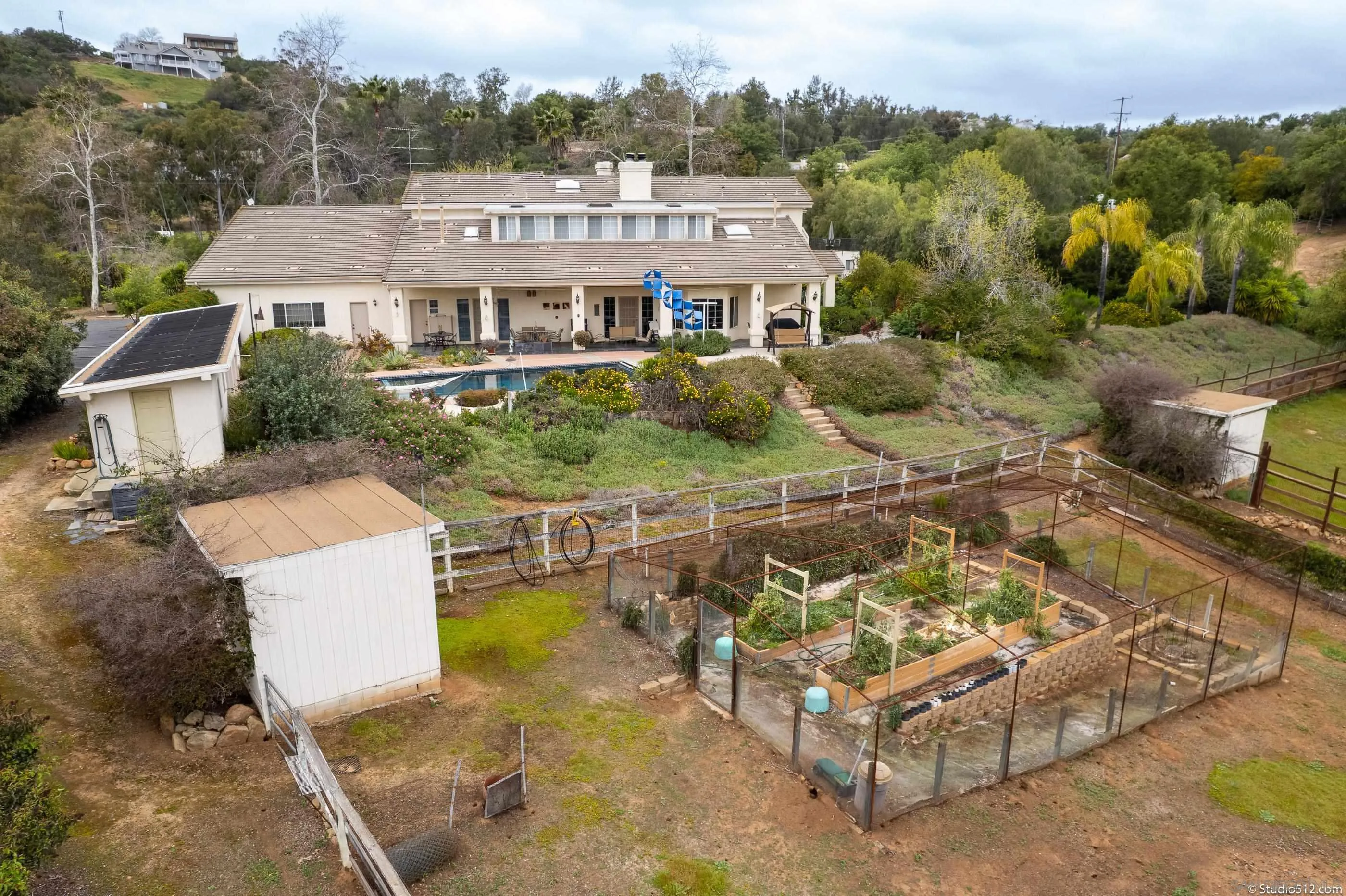28398 Alamar Road Valley Center, CA 92082 - Photo 39 of 41 an aerial view of a house with a garden