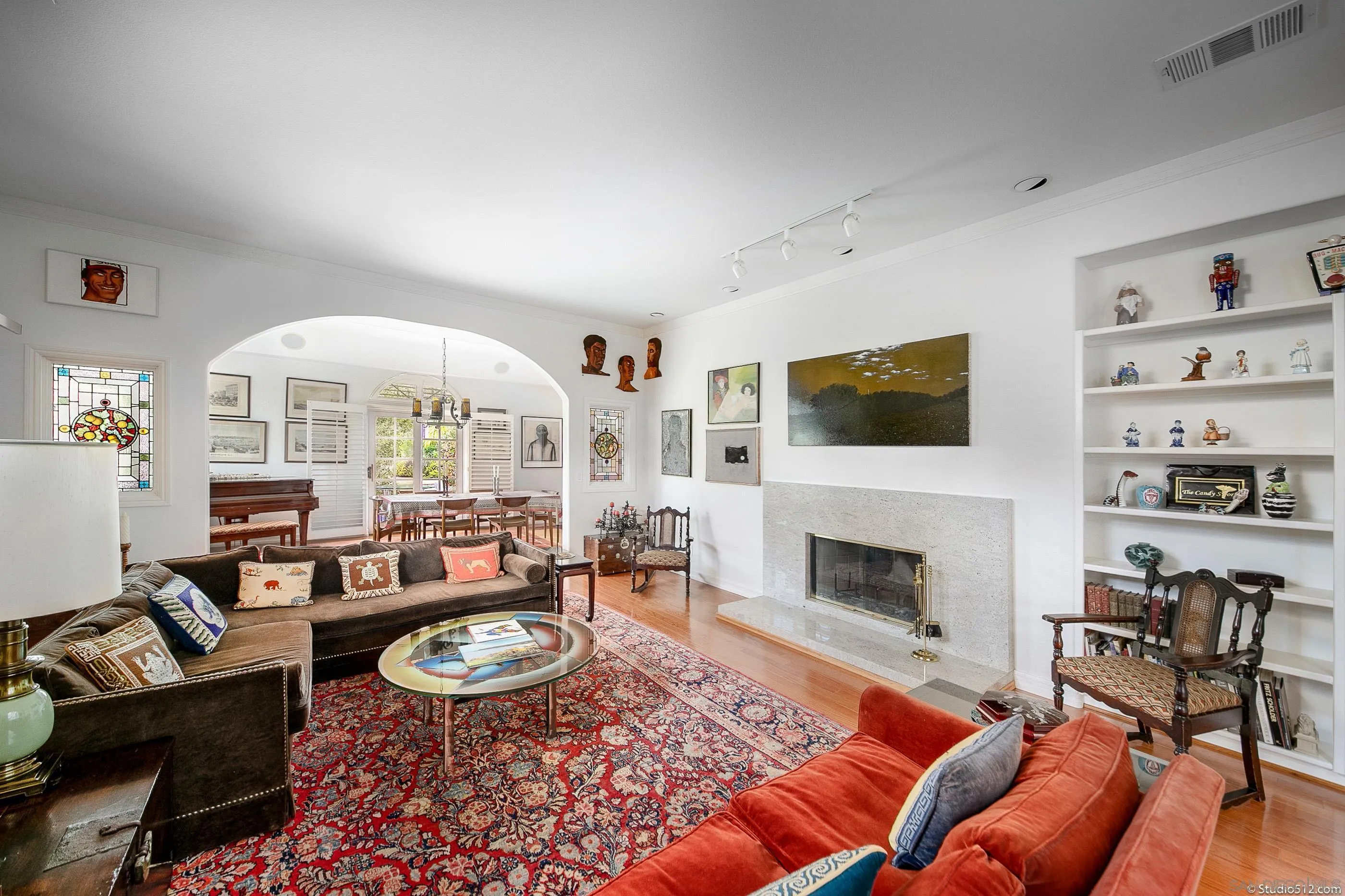 28398 Alamar Road Valley Center, CA 92082 - Photo 6 of 41 a living room with furniture a flat screen tv and a fireplace