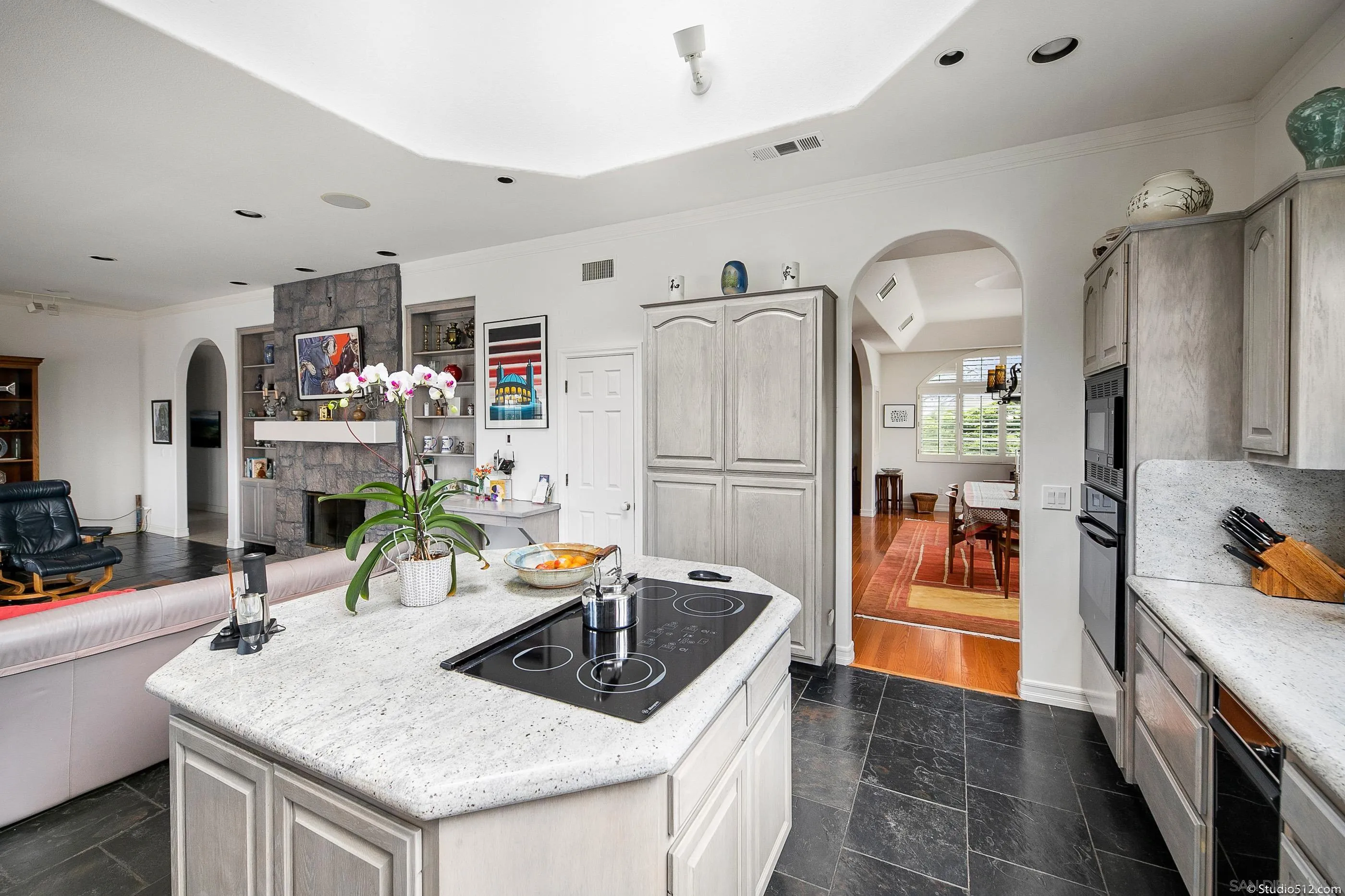 28398 Alamar Road Valley Center, CA 92082 - Photo 9 of 41 a kitchen that has a sink and a refrigerator