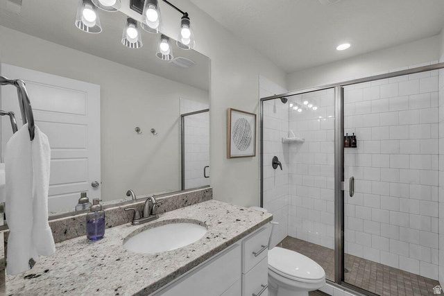 5010 Escapes Drive St. George, UT 84770 - Photo 19 of 46 Full bath featuring vanity and a shower stall