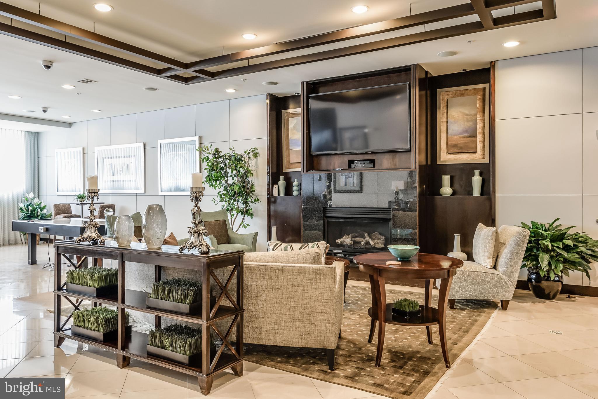 12001 Market Street, Unit 436 Reston, VA 20190 - Photo 22 of 28 Community room