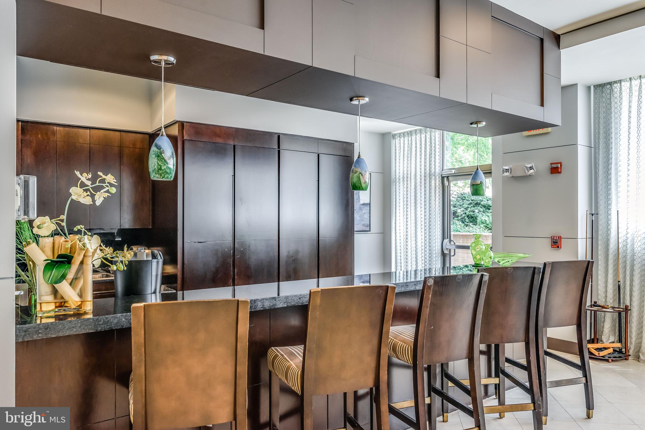 12001 Market Street, Unit 436 Reston, VA 20190 - Photo 24 of 28 Bar/eating area