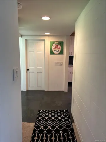 a bathroom with a bathtub and shower