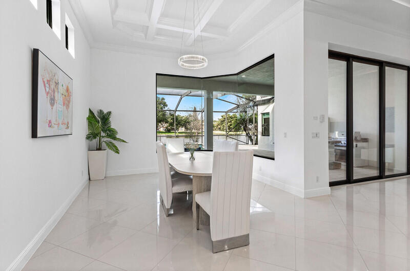12153 Boca Reserve Lane Boca Raton, FL 33428 - Photo 11 of 35 a view of a dining room with furniture window and outside view