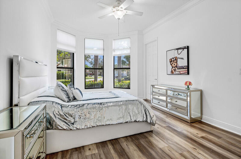 12153 Boca Reserve Lane Boca Raton, FL 33428 - Photo 23 of 35 a living room with furniture and a window