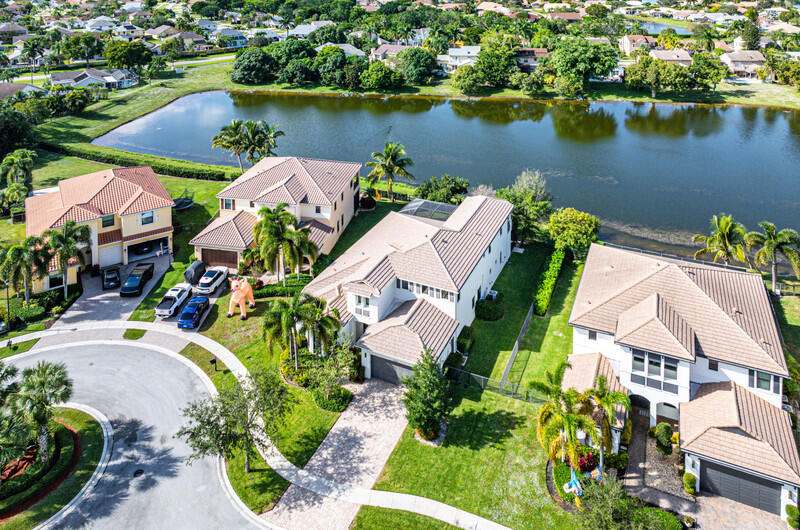 12153 Boca Reserve Lane Boca Raton, FL 33428 - Photo 32 of 35 an aerial view of house with yard and lake view