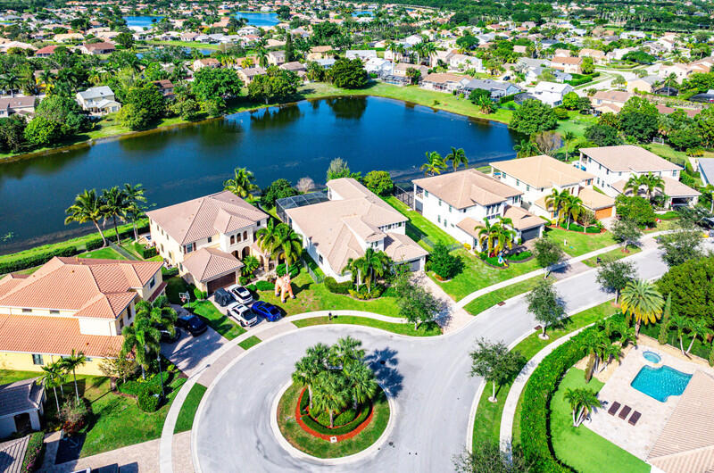 12153 Boca Reserve Lane Boca Raton, FL 33428 - Photo 35 of 35 an aerial view of a house with outdoor space and lake view