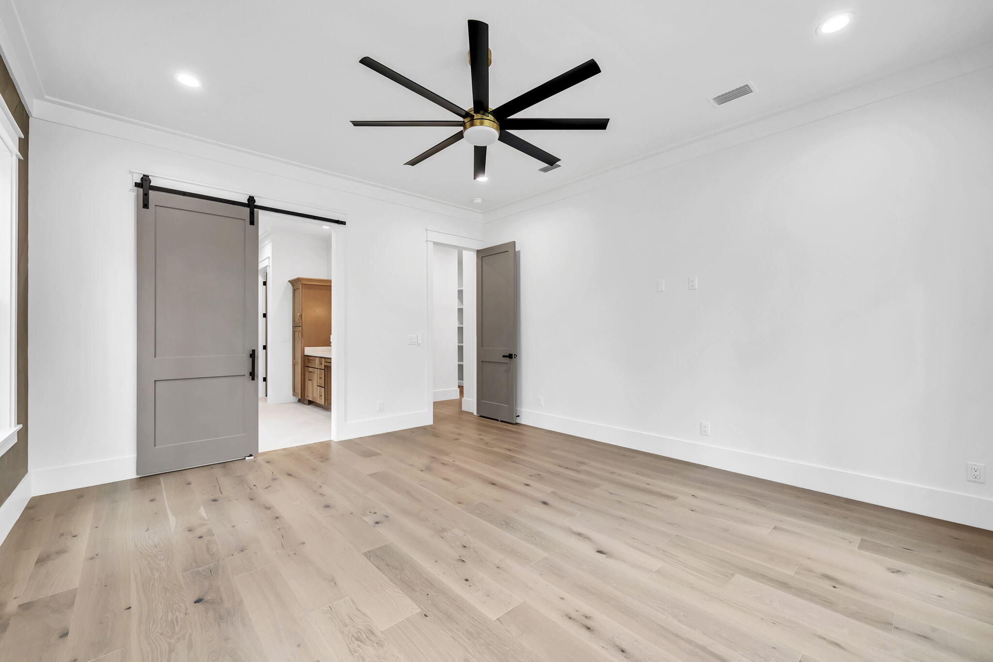 123 West Captain Fritz Way Freeport, FL 32439 - Photo 33 of 123 Primary w/ Barn Door Bath Access