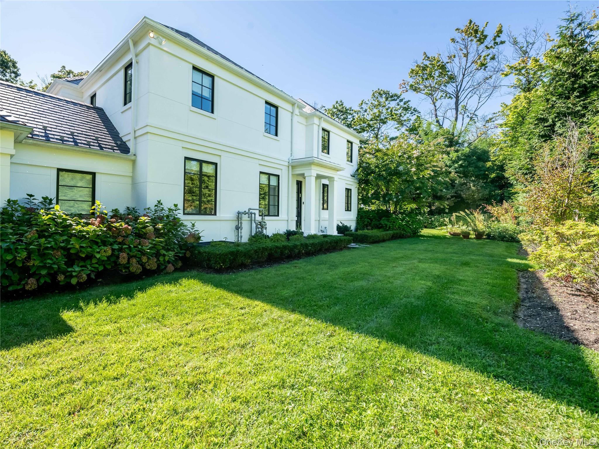 16 Ridge Drive East Great Neck, NY 11021 - Photo 44 of 50 Side Of House