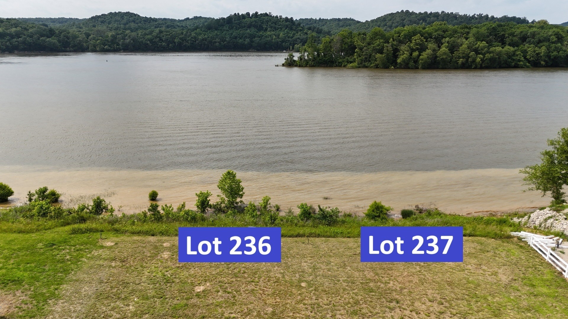 2623 Hardin Bottom River Road Clifton, TN 38425 - Photo 1 of 9 a view of a lake with houses