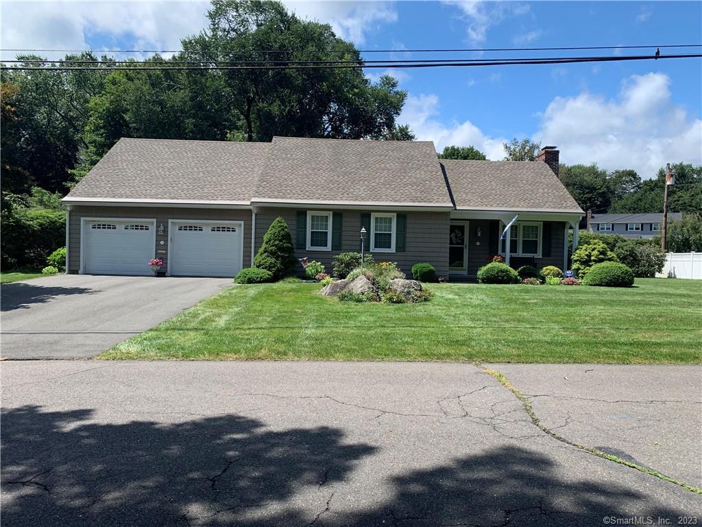 54 Round Hill Road Naugatuck, CT 06770 - Photo 1 of 1 front view of house with a yard