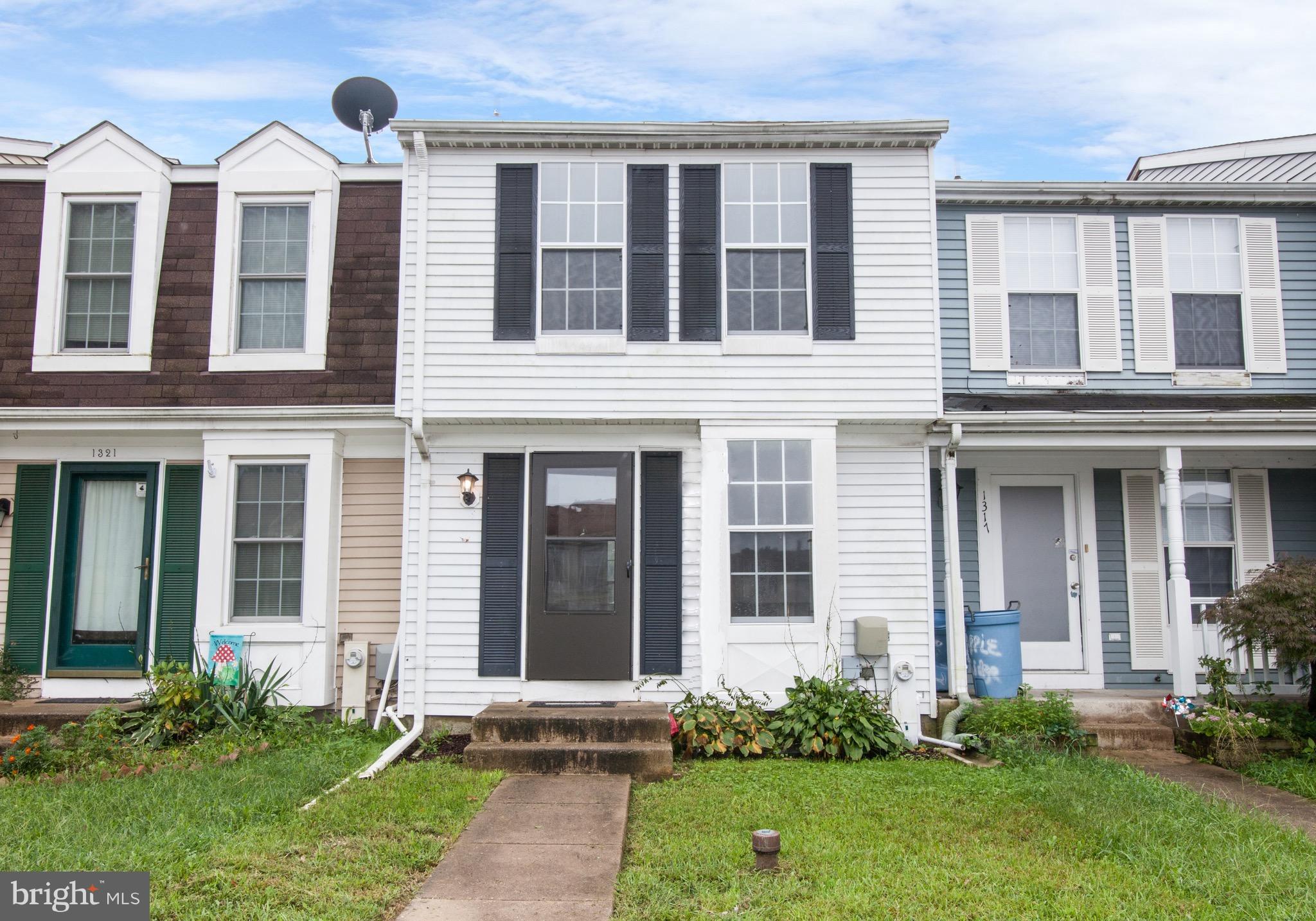 1319 Apple Ridge Court Edgewood, MD 21040 - Photo 1 of 23 a front view of a house with a yard