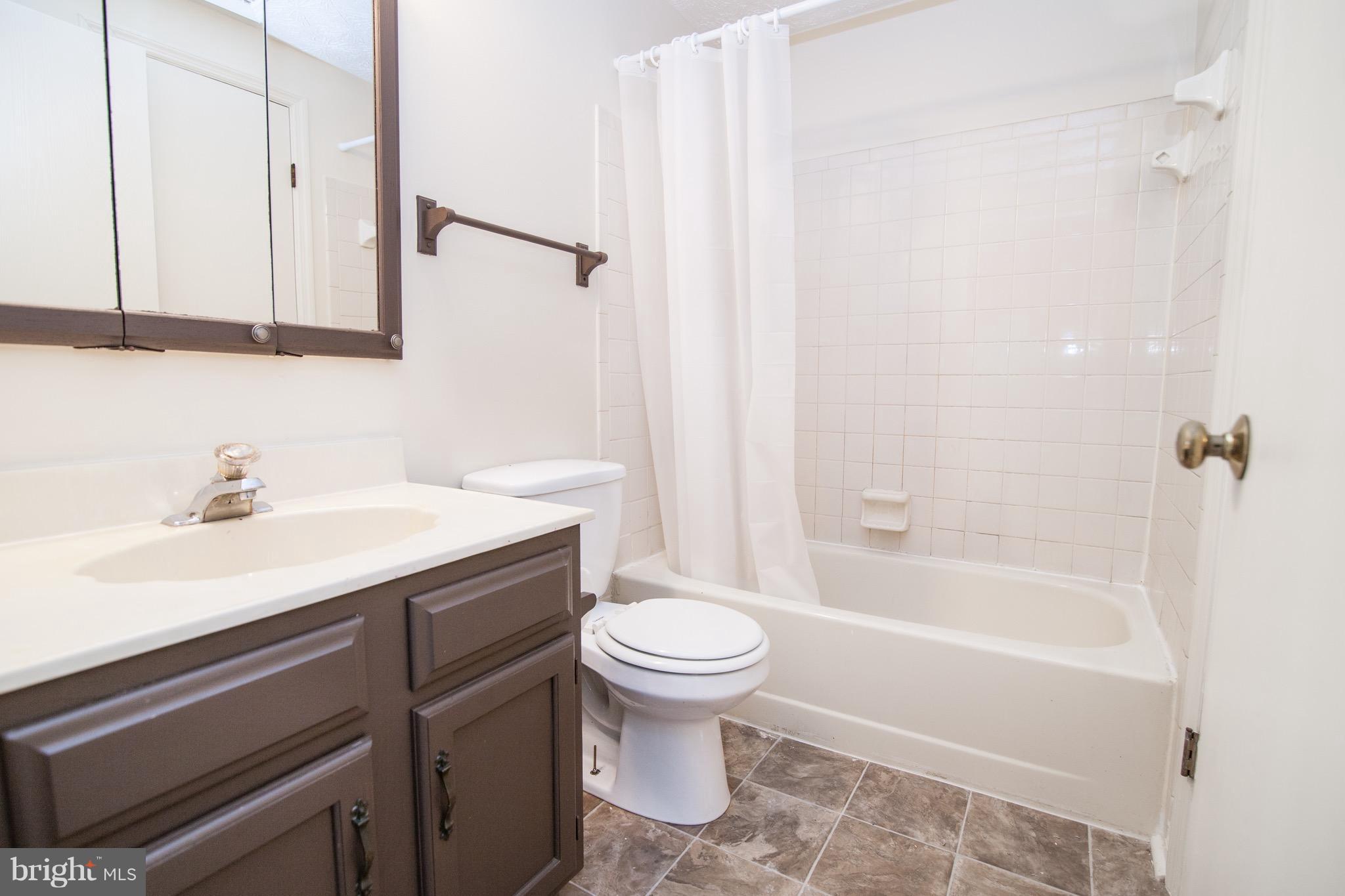 1319 Apple Ridge Court Edgewood, MD 21040 - Photo 15 of 23 a bathroom with a sink a toilet and a bathtub