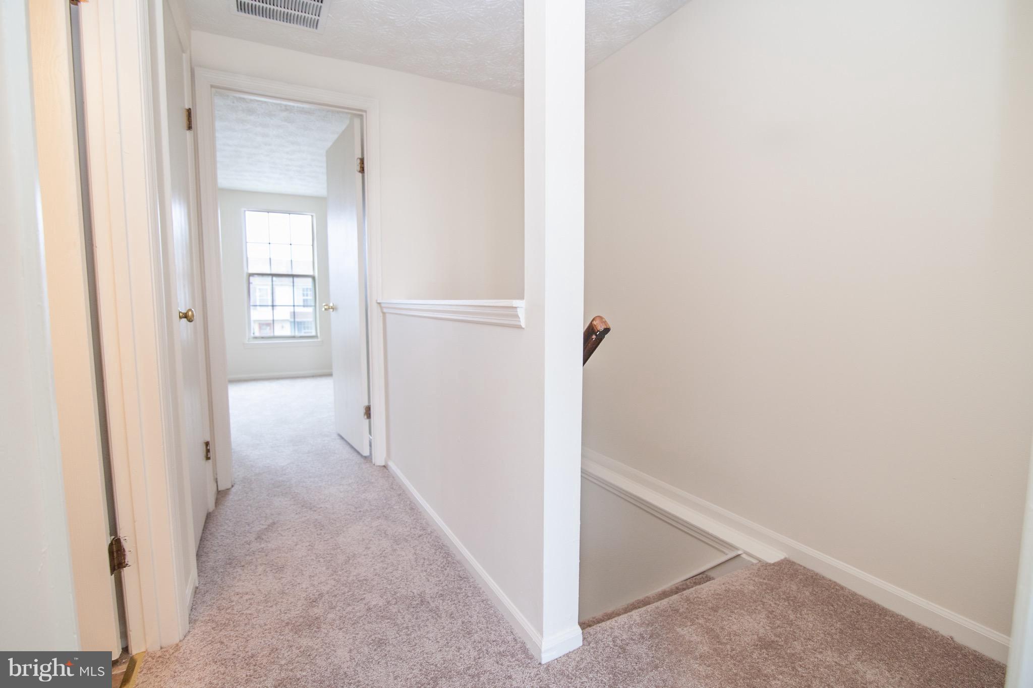 1319 Apple Ridge Court Edgewood, MD 21040 - Photo 16 of 23 a view of a hallway with closet