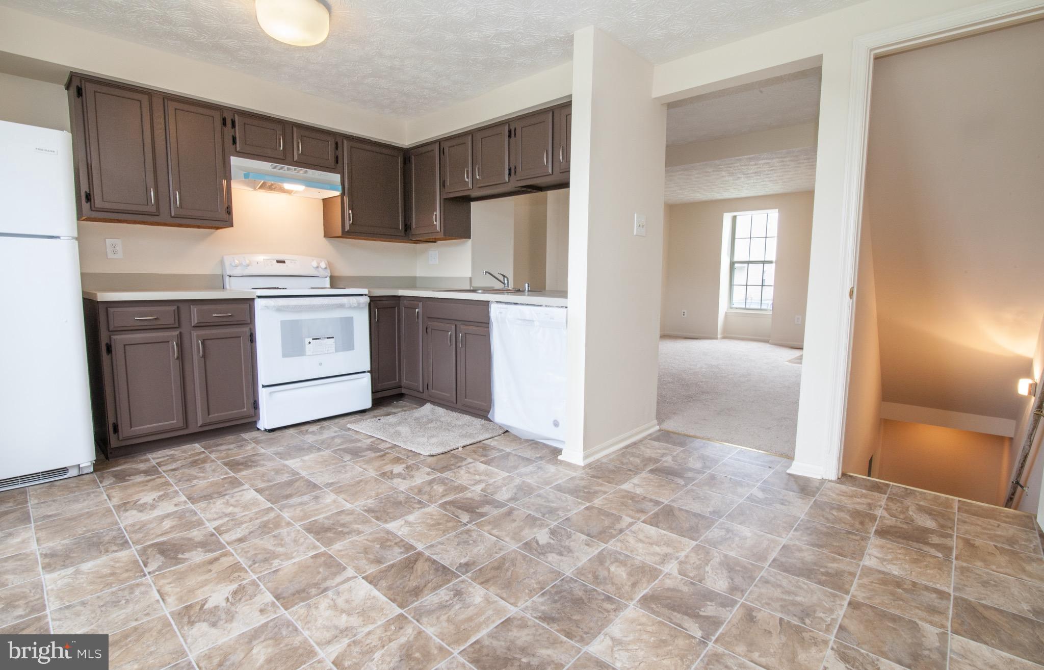 1319 Apple Ridge Court Edgewood, MD 21040 - Photo 4 of 23 a kitchen with stainless steel appliances granite countertop a refrigerator sink and cabinets