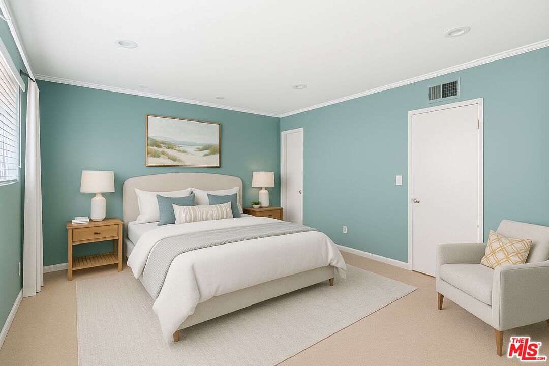 10671 Wilkins Avenue, Unit 5 Los Angeles, CA 90024 - Photo 13 of 28 a bedroom with a bed and a couch