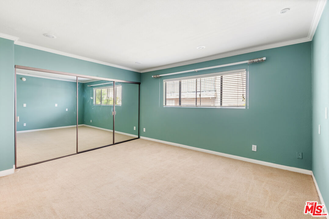 10671 Wilkins Avenue, Unit 5 Los Angeles, CA 90024 - Photo 16 of 28 a view of an empty room with glass door
