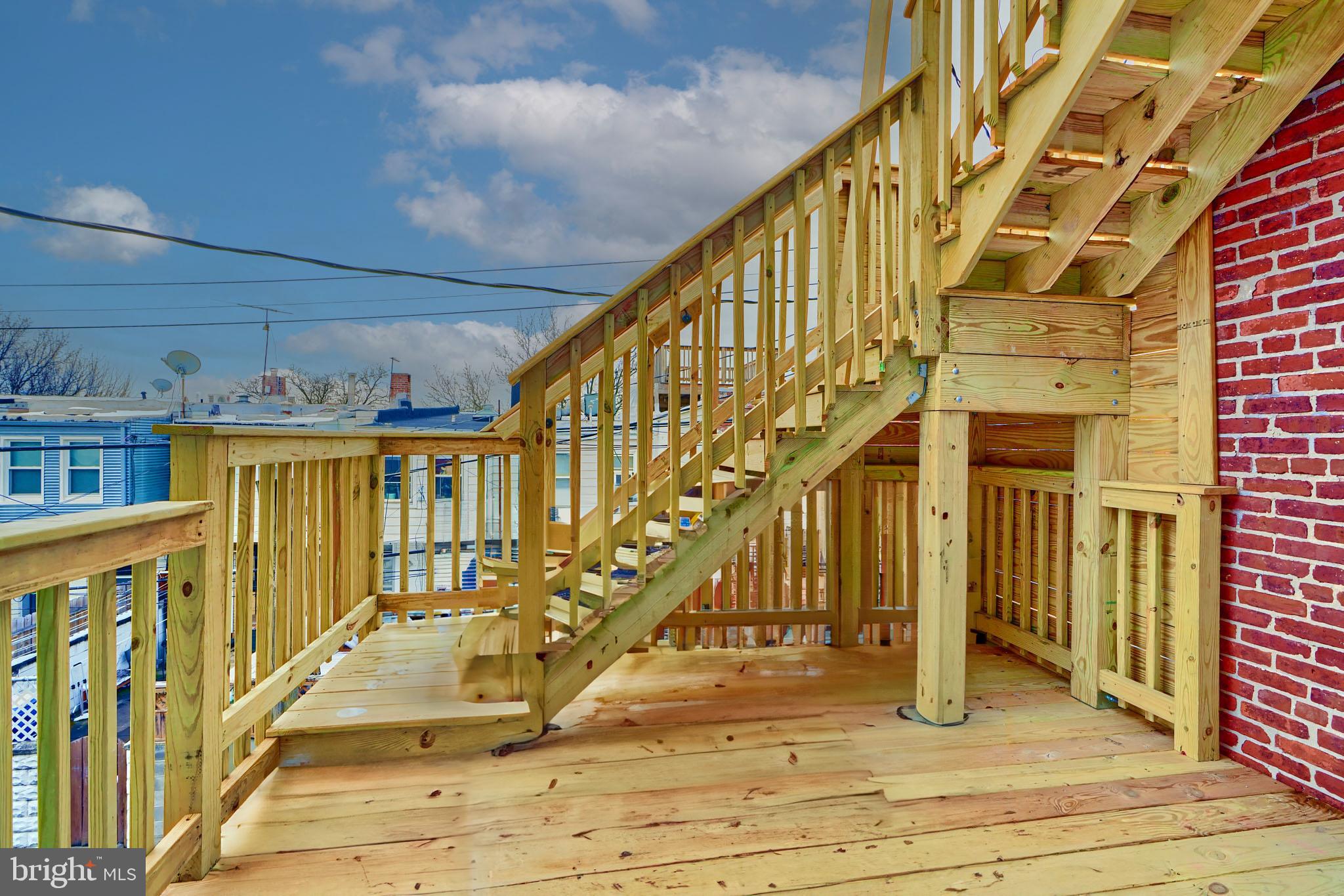 602 South Streeper Street Baltimore, MD 21224 - Photo 19 of 31 a view of entryway and hall with wooden floor