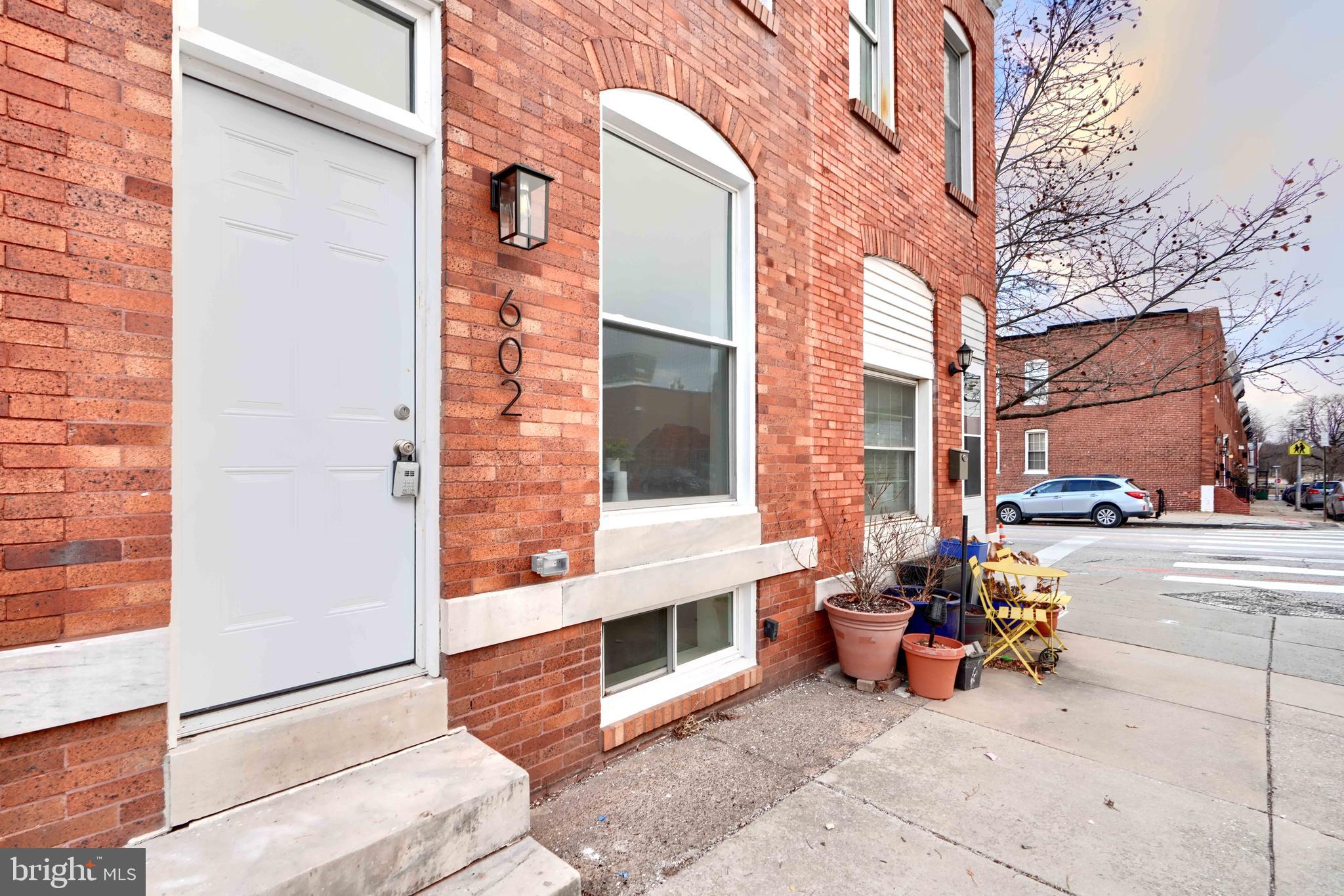 602 South Streeper Street Baltimore, MD 21224 - Photo 2 of 31 a view of outdoor space with seating area and barbeque oven
