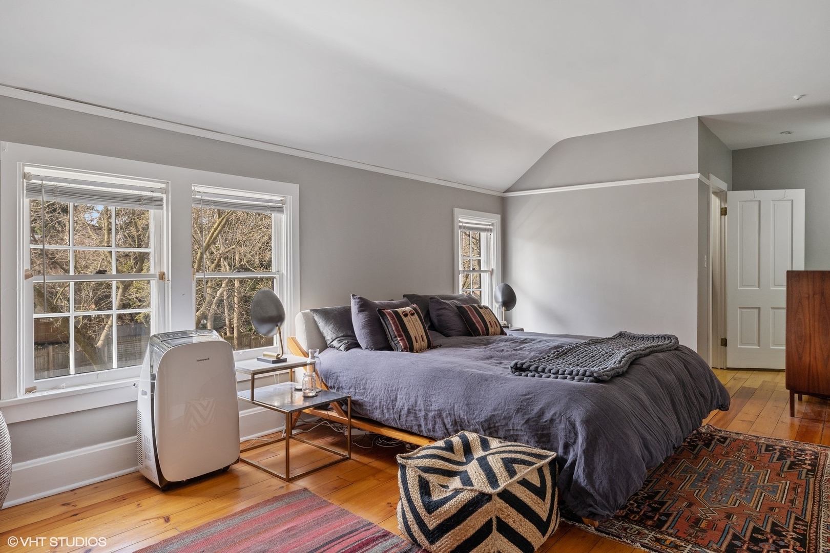 2404 Ridge Avenue Evanston, IL 60201 - Photo 14 of 24 a bedroom with a bed and wooden floor