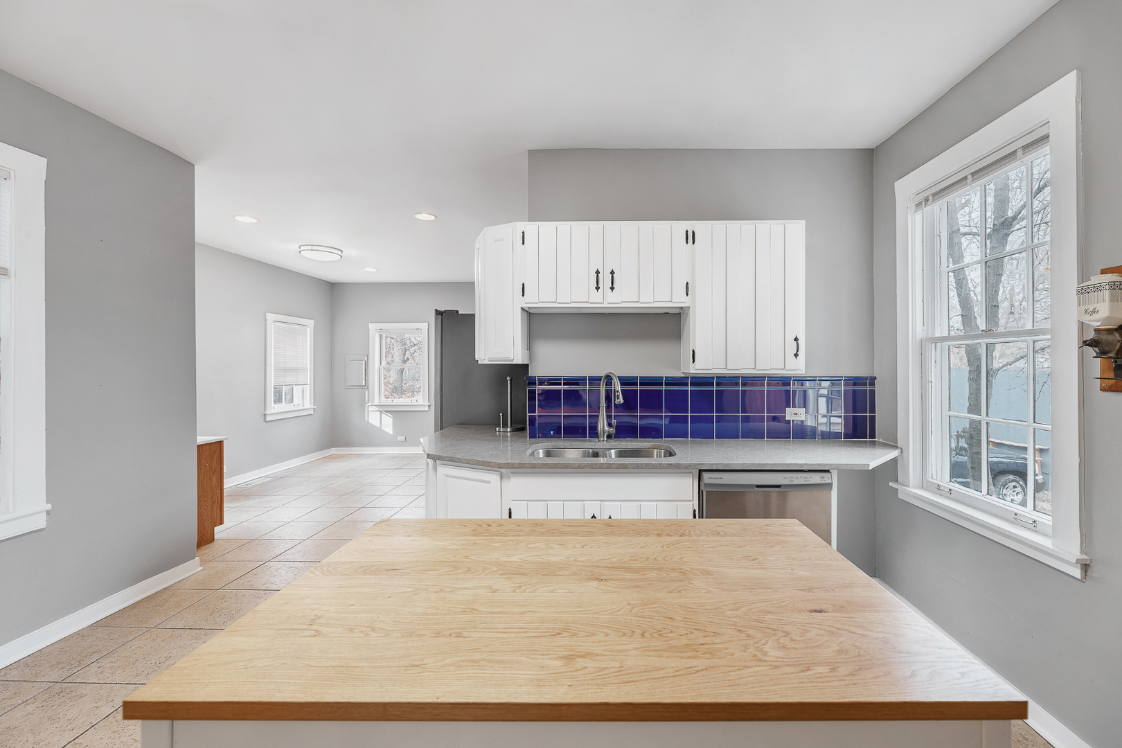 2404 Ridge Avenue Evanston, IL 60201 - Photo 6 of 24 a living room with kitchen furniture and a fireplace