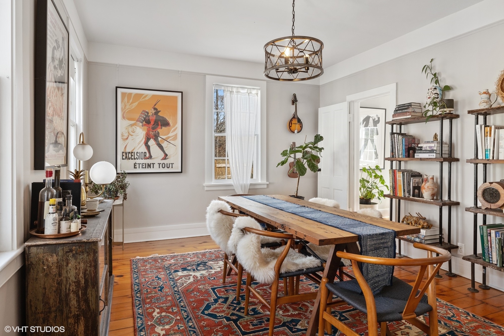 2404 Ridge Avenue Evanston, IL 60201 - Photo 7 of 24 a view of a dining room with furniture wooden floor and a chandelier