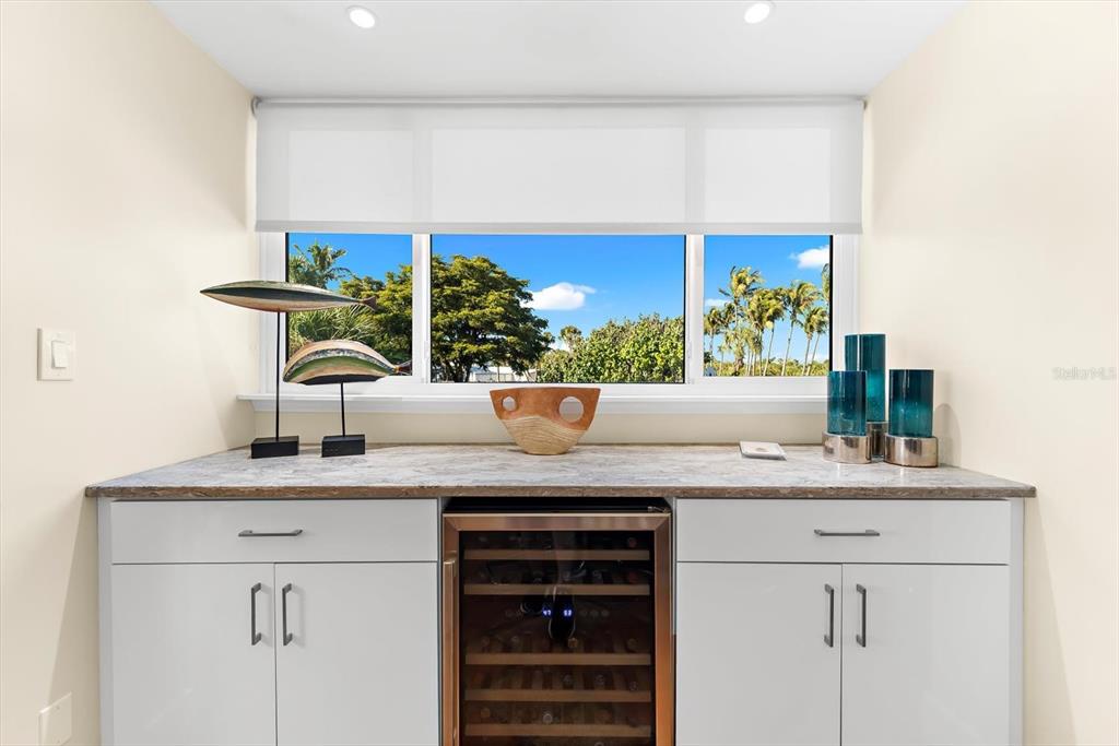 5000 Gasparilla Road, Unit 13A Boca Grande, FL 33921 - Photo 13 of 61 a kitchen with a sink and a window