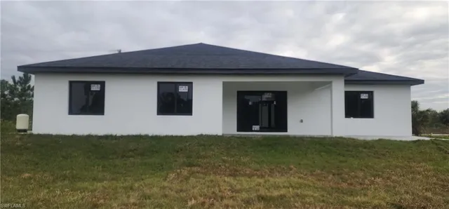 $334,990 | 404 Lambda Avenue South, Lehigh Acres, FL 33974