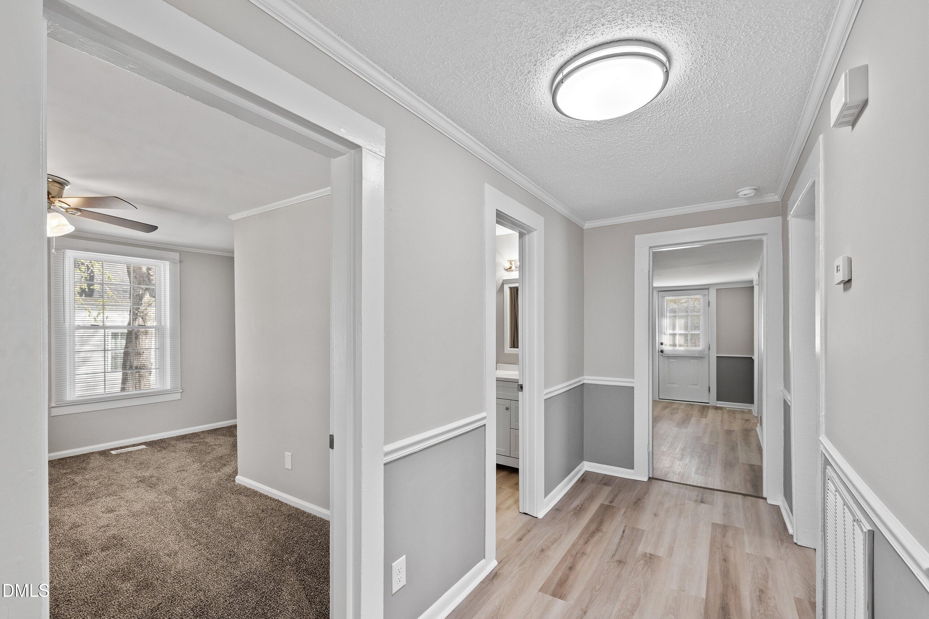 105 East I Street Erwin, NC 28339 - Photo 31 of 39 a view of a room with wooden floor and windows