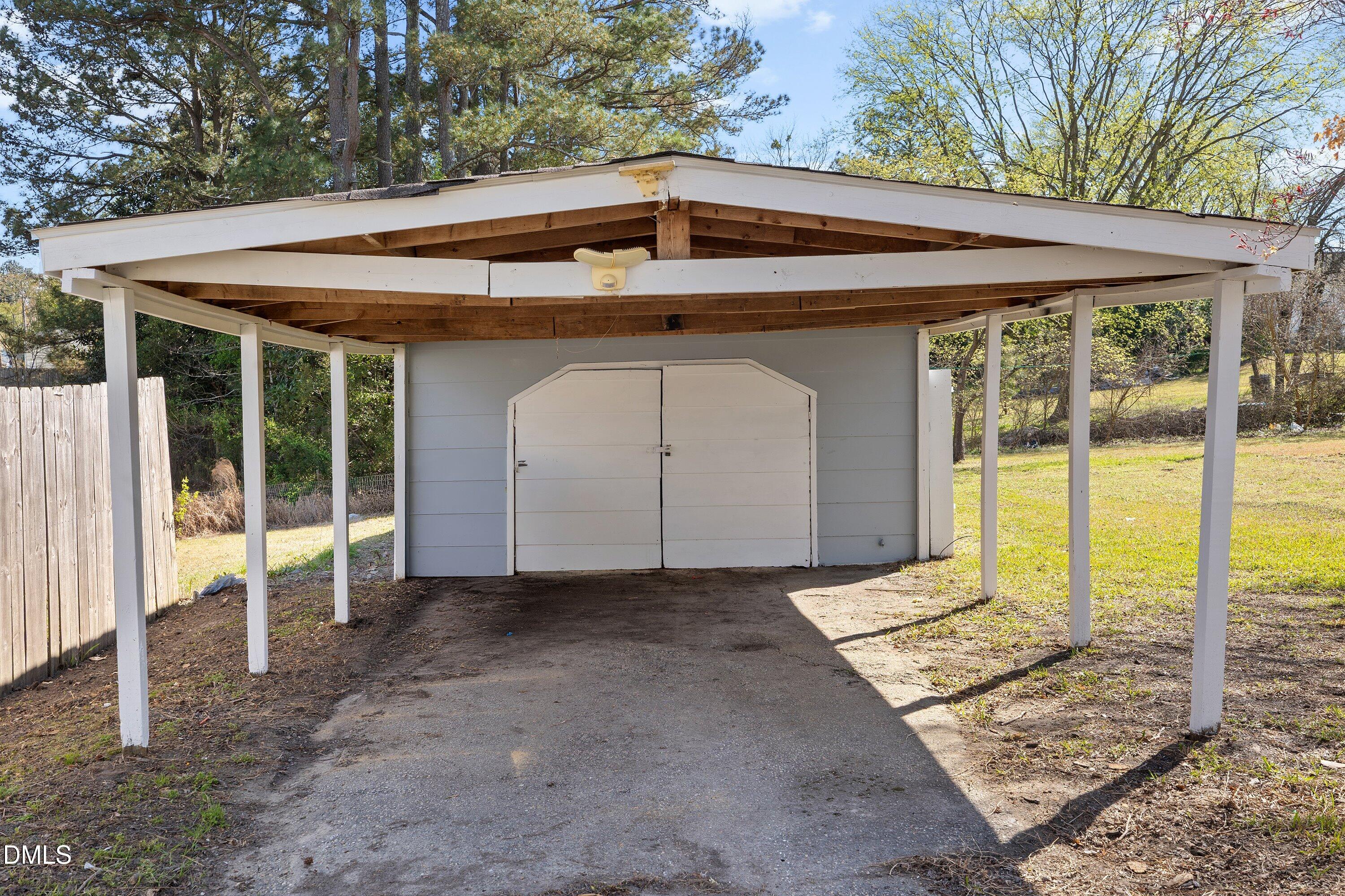 105 East I Street Erwin, NC 28339 - Photo 34 of 39 a front view of a house with a yard