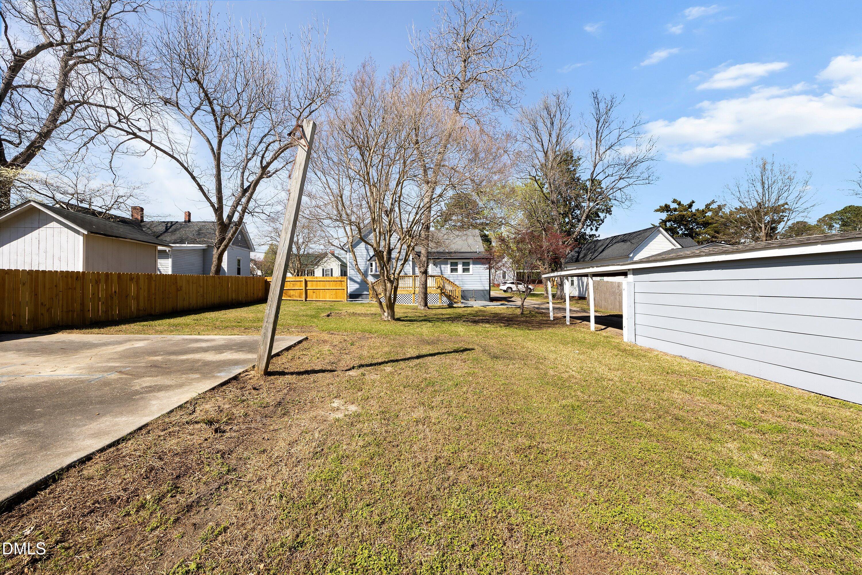 105 East I Street Erwin, NC 28339 - Photo 37 of 39 a view of a yard with a tree