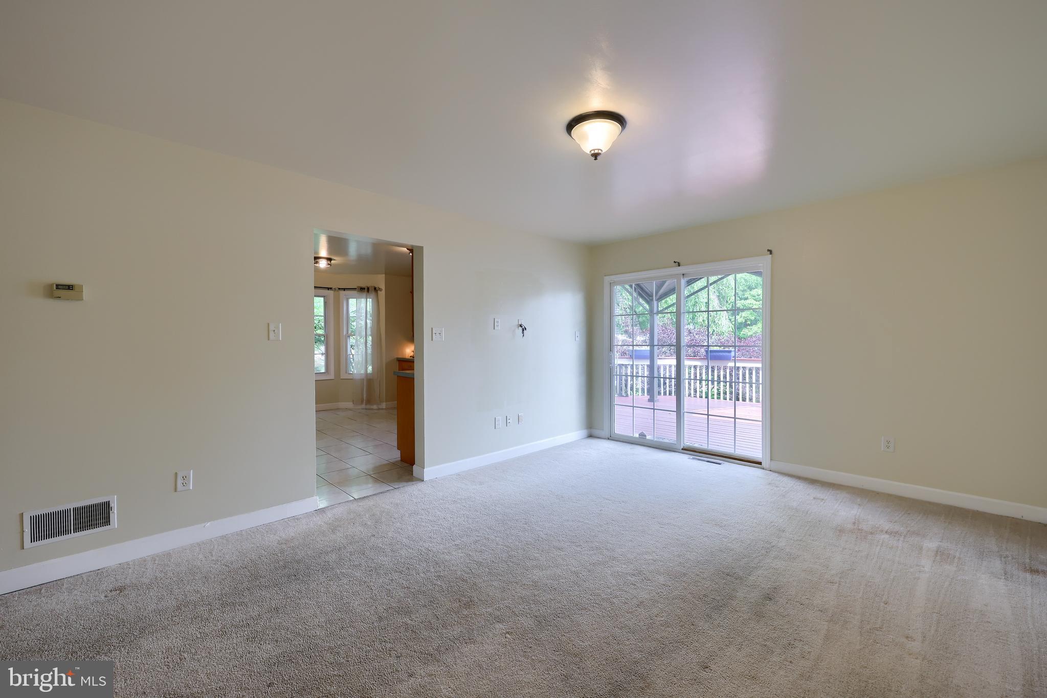 148 Michigan Drive Sinking Spring, PA 19608 - Photo 27 of 50 an empty room with windows and entrance