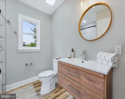 a bathroom with a bathtub and shower