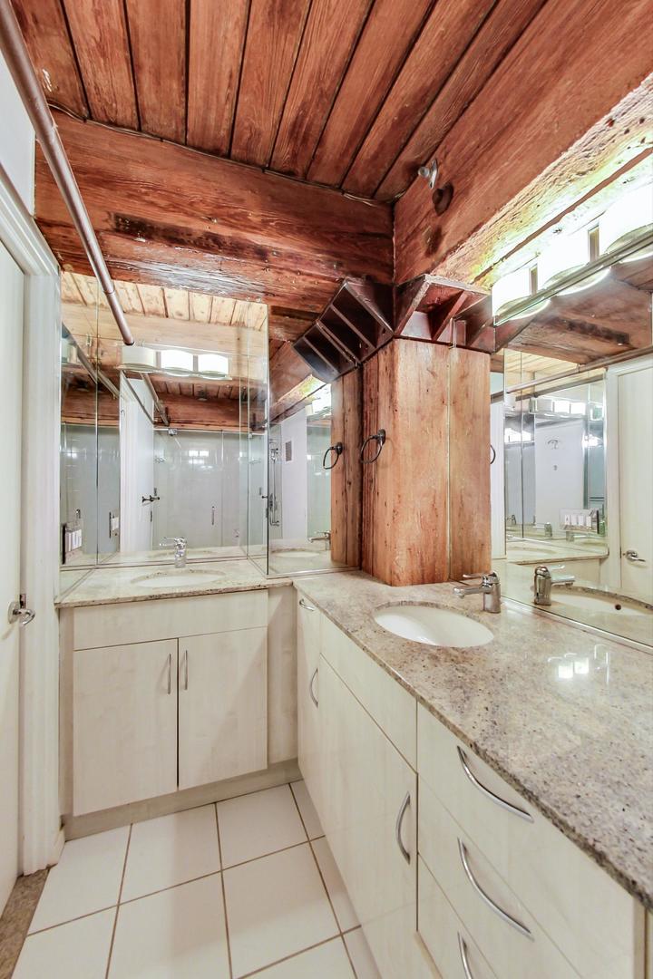 1000 West Washington Boulevard, Unit 130 Chicago, IL 60607 - Photo 30 of 47 a kitchen with sink and cabinets