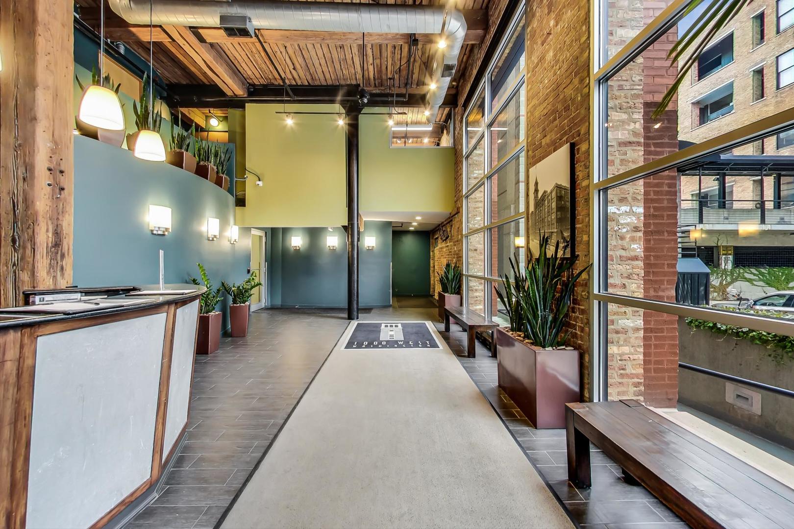 1000 West Washington Boulevard, Unit 130 Chicago, IL 60607 - Photo 6 of 47 a lobby with furniture