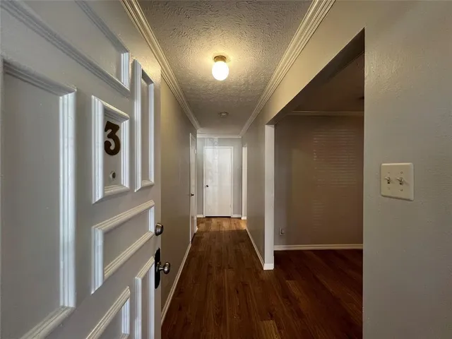 a view of hallway with stairs