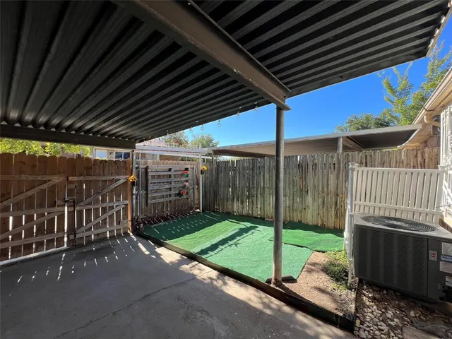 a view of a backyard with a deck
