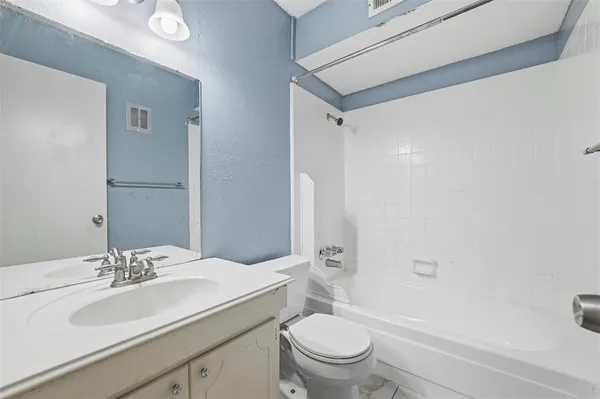 a view of a bedroom from the hallway