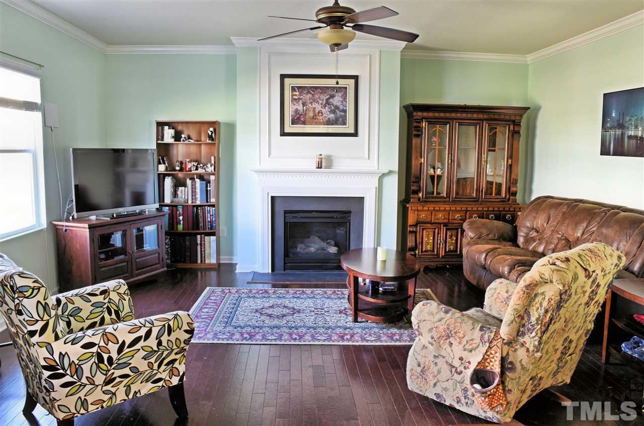 8137 Hovingham Way Raleigh, NC 27616 - Photo 5 of 20 Very comfortable with gas logs in the fireplace.