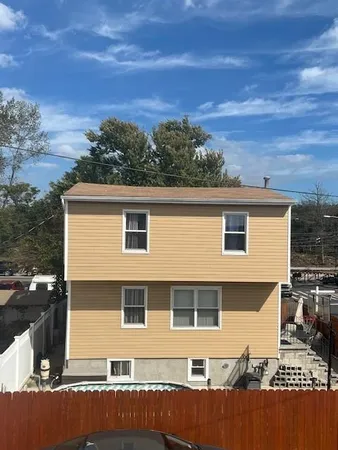 a view of a house with a patio