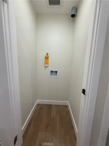 a bathroom with a double vanity sink toilet and shower