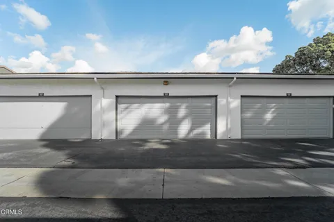 an aerial view of a house with a garden