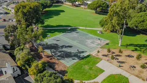 a view of a street with a park