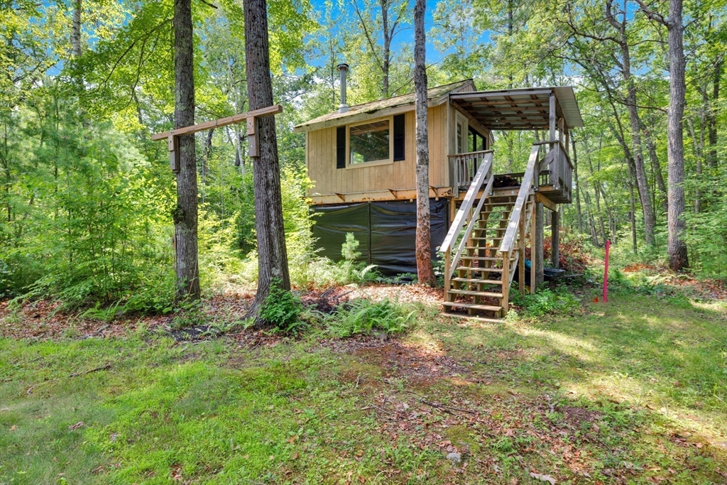 150 Osborne Road Ware, MA 01082 - Photo 13 of 38 a view of a house with backyard