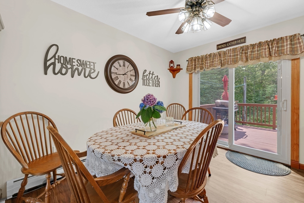 150 Osborne Road Ware, MA 01082 - Photo 18 of 38 a view of a dining room with furniture window and wooden floor