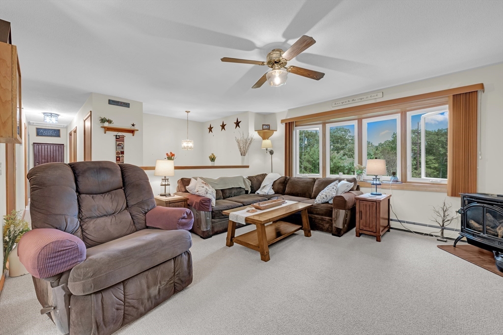 150 Osborne Road Ware, MA 01082 - Photo 20 of 38 a living room with furniture and a large window