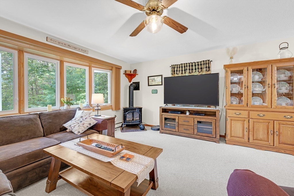 150 Osborne Road Ware, MA 01082 - Photo 21 of 38 a living room with furniture and a flat screen tv