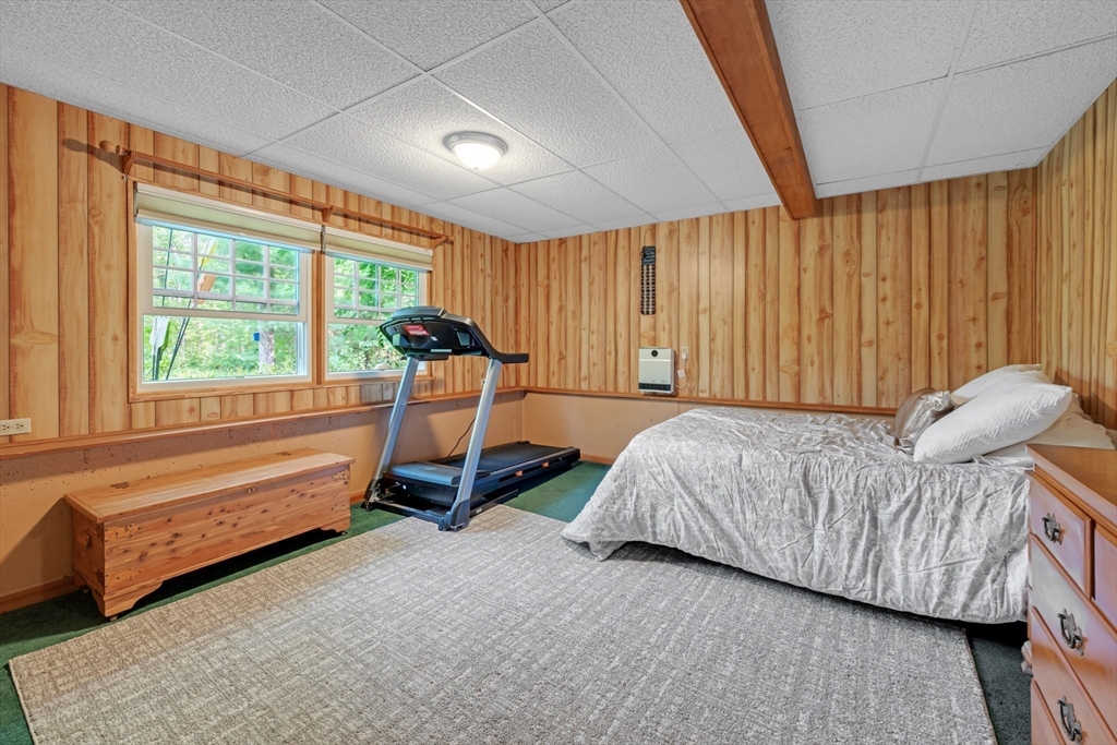 150 Osborne Road Ware, MA 01082 - Photo 31 of 38 a bed sitting in a spacious bedroom next to a window